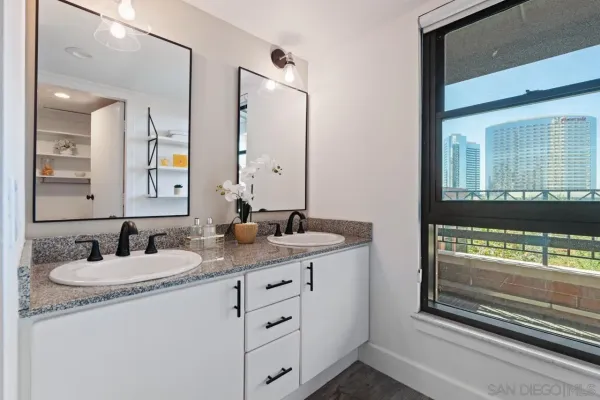 a bathroom with a sink and a mirror