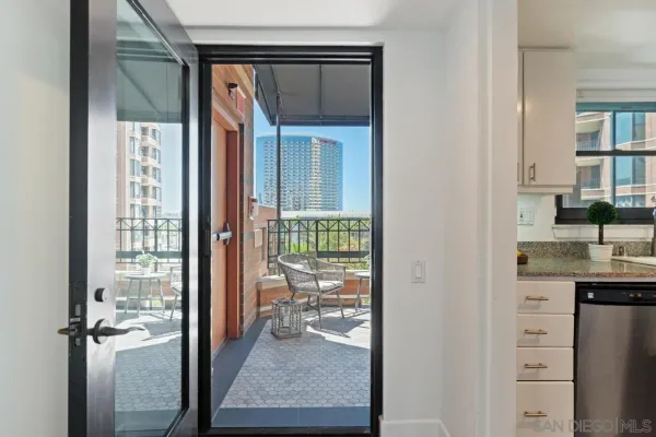 a view of a bathroom with a glass door