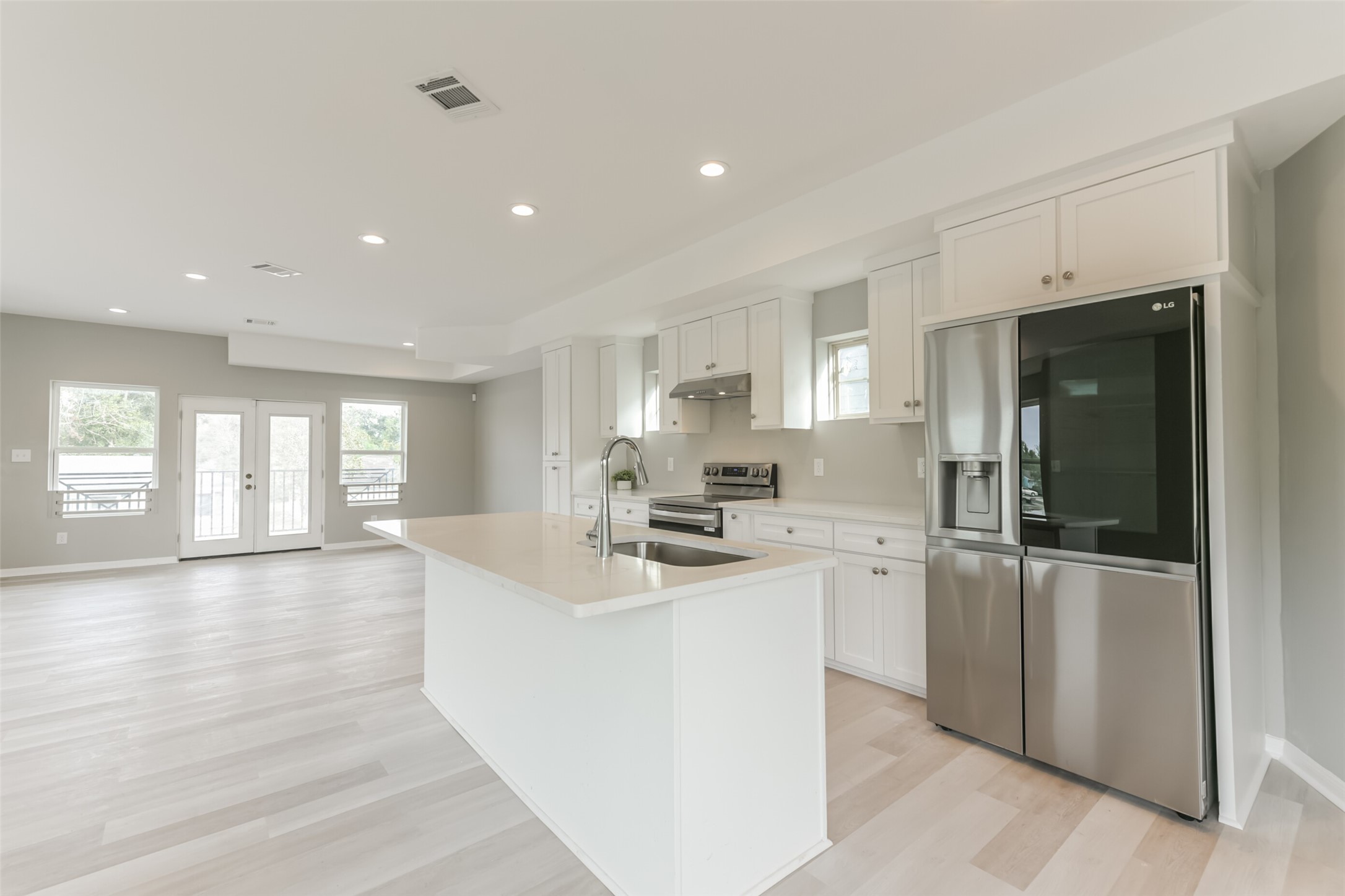 5302 Tarawa Road Houston, TX 77033 - Photo 13 of 35 a kitchen with sink and refrigerator