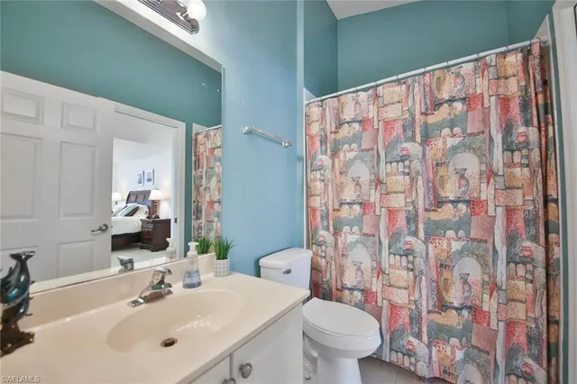 a bathroom with a sink and toilet