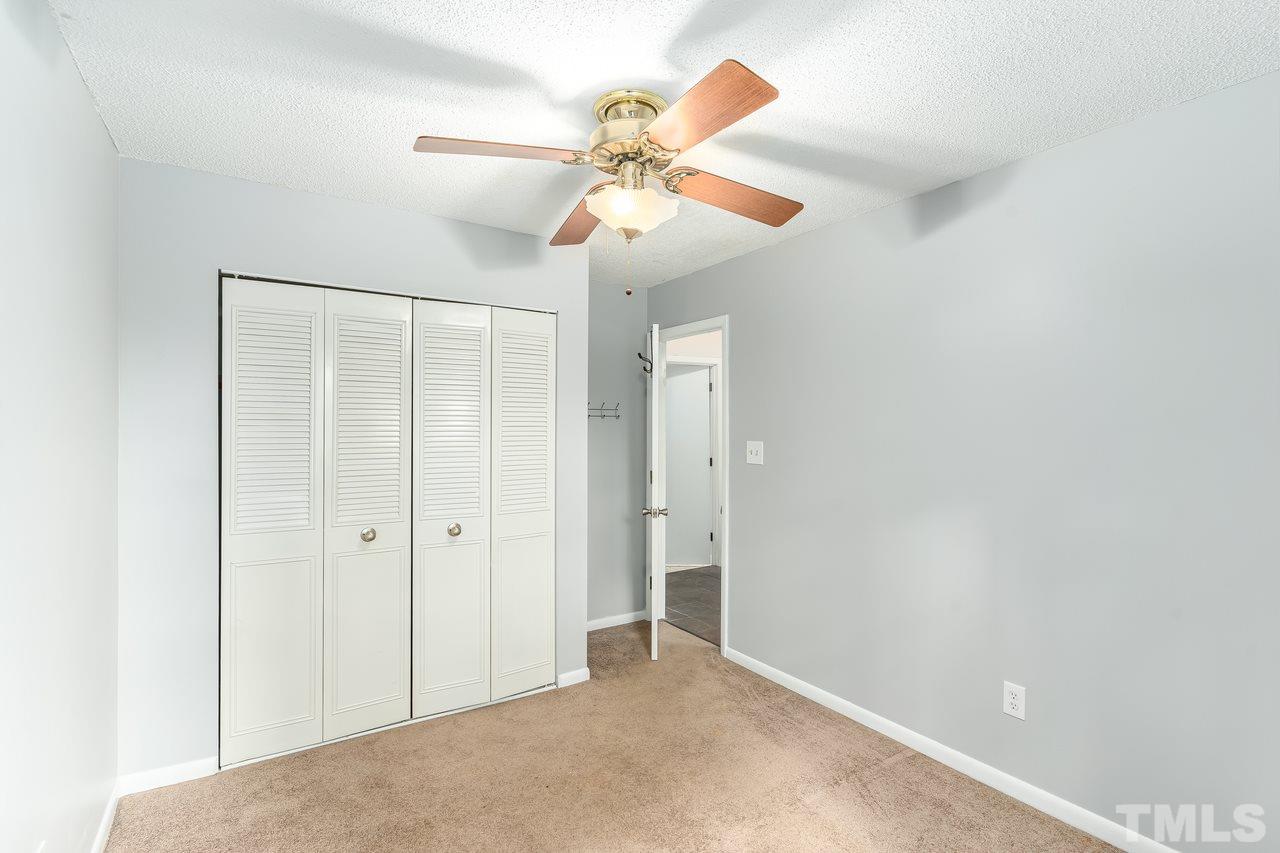 707 Godwin Court Raleigh, NC 27606 - Photo 20 of 26 a view of a chandelier fan in a room