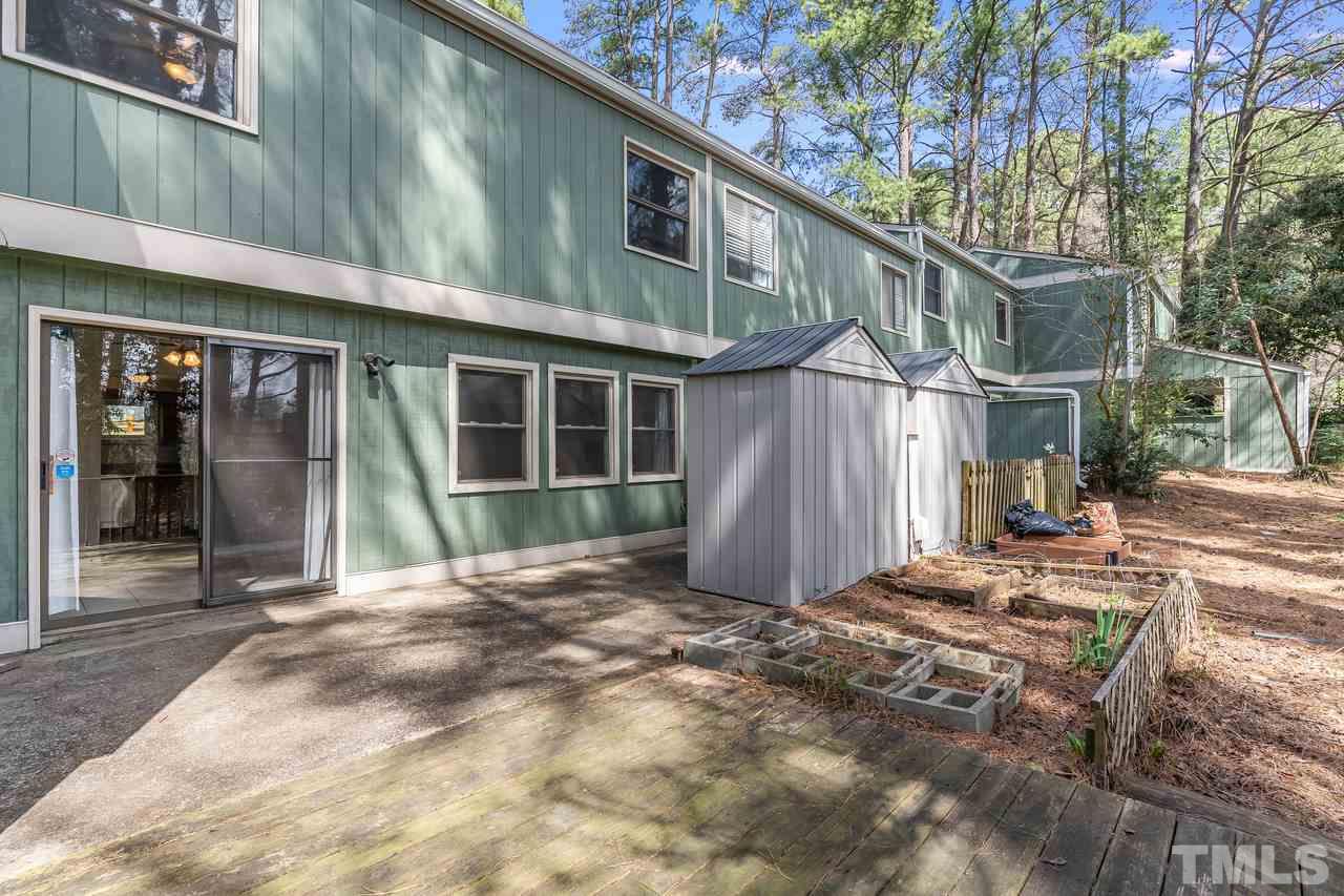 707 Godwin Court Raleigh, NC 27606 - Photo 23 of 26 a view of a house with a yard