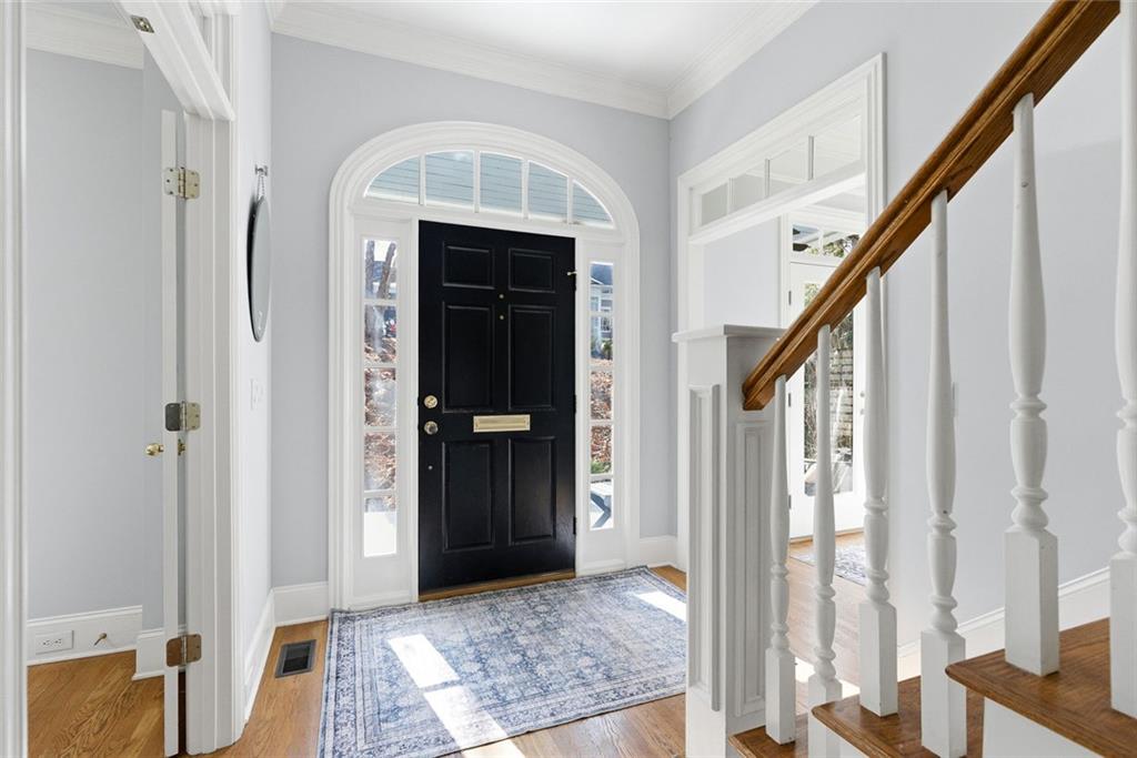 80 Fowler Avenue Roswell, GA 30075 - Photo 11 of 74 a view of an entryway with wooden floor and stairs