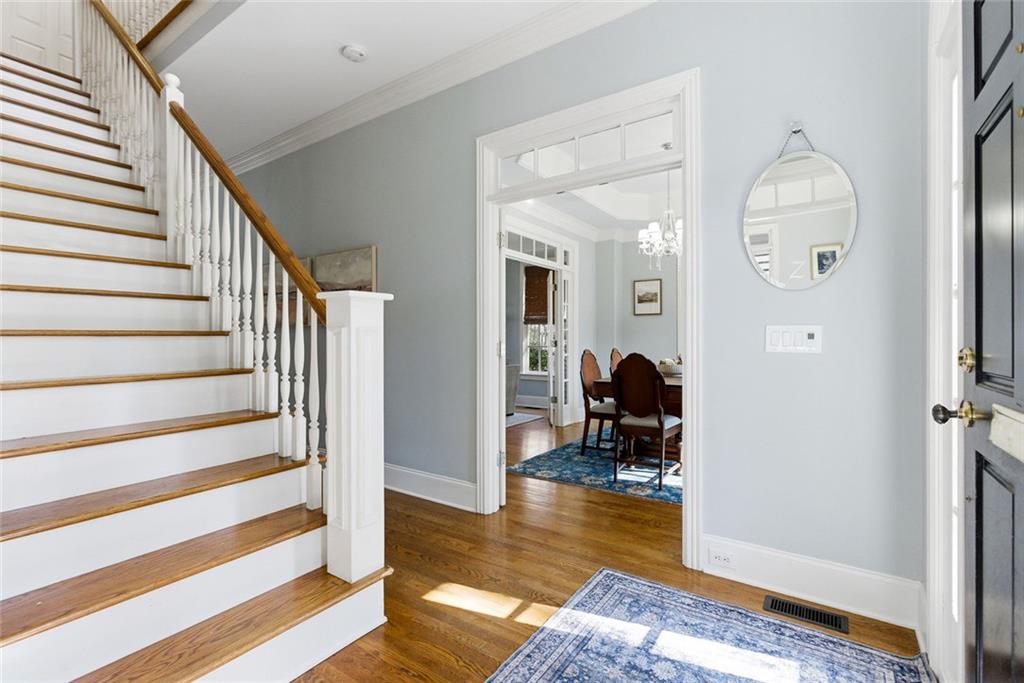 80 Fowler Avenue Roswell, GA 30075 - Photo 12 of 74 a living room with furniture and a chandelier