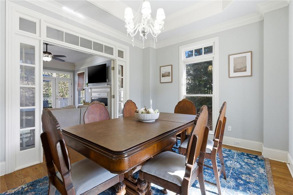 80 Fowler Avenue Roswell, GA 30075 - Photo 16 of 74 a view of a dining room with furniture window and wooden floor