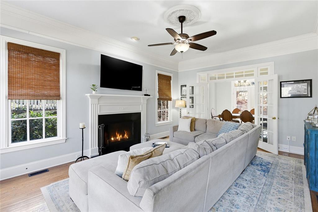 80 Fowler Avenue Roswell, GA 30075 - Photo 24 of 74 a living room with furniture fireplace and flat screen tv