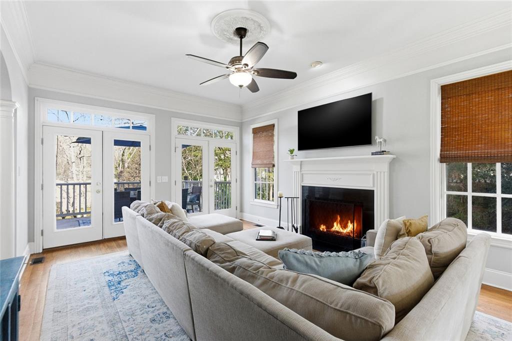 80 Fowler Avenue Roswell, GA 30075 - Photo 25 of 74 a living room with furniture fireplace and flat screen tv