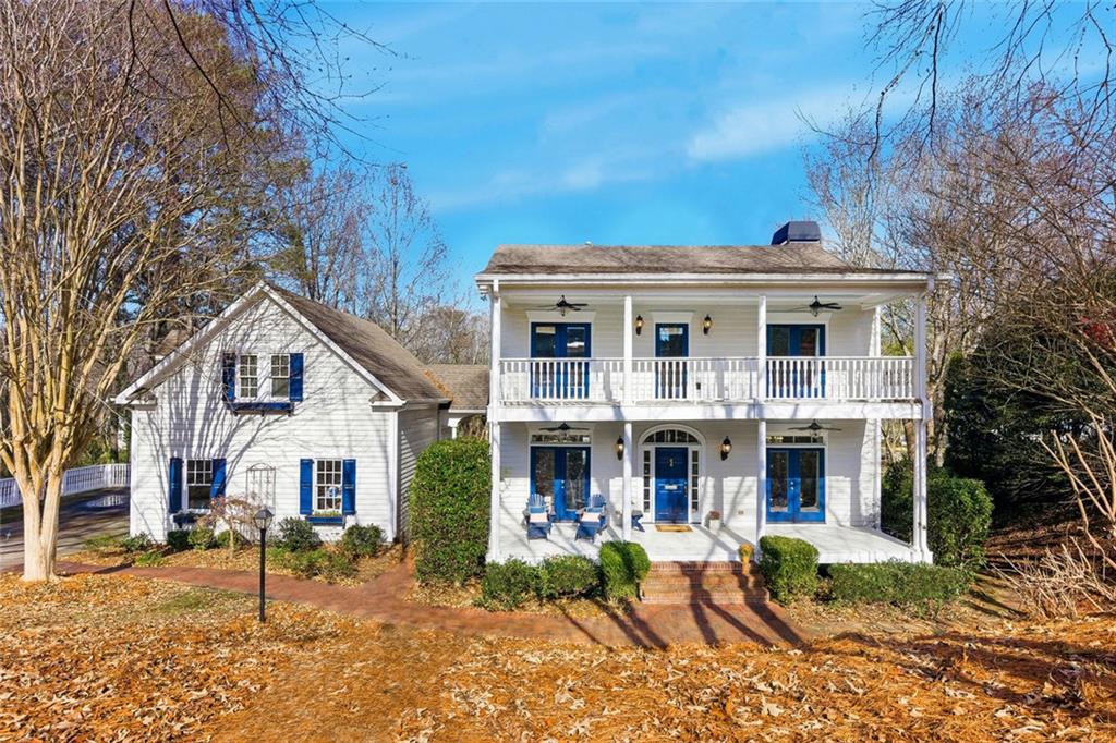 80 Fowler Avenue Roswell, GA 30075 - Photo 4 of 74 a view of a house with a yard and sitting area