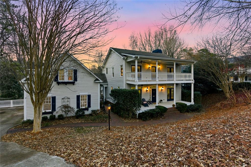 80 Fowler Avenue Roswell, GA 30075 - Photo 70 of 74 a front view of a house with garden