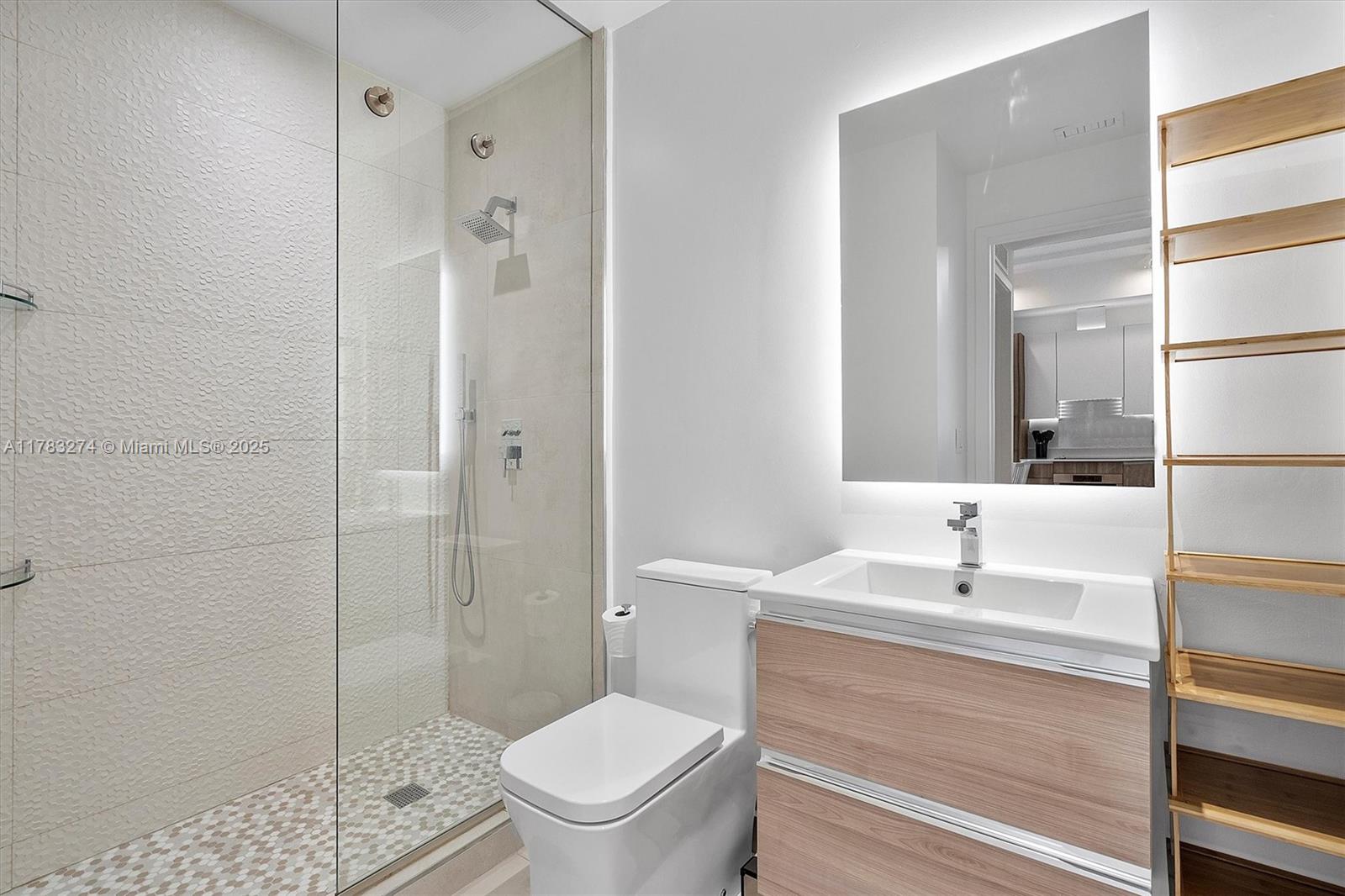 239 Southwest 9th Street, Unit 1704 Miami, FL 33130 - Photo 16 of 36 a bathroom with a sink toilet and shower