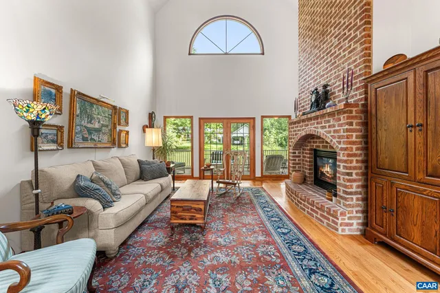 a room with fireplace and window