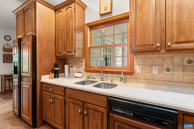a view of workspace with furniture and window