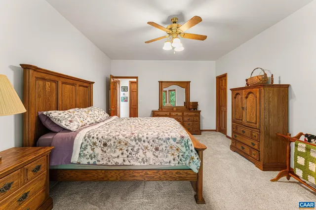 a view of a livingroom with furniture and a window