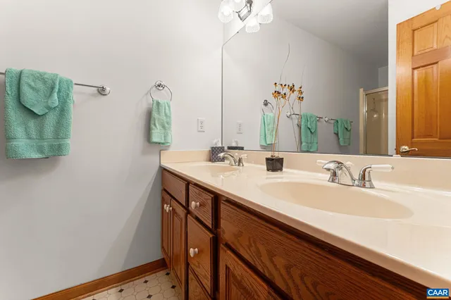 a view of backyard with outdoor seating and green space