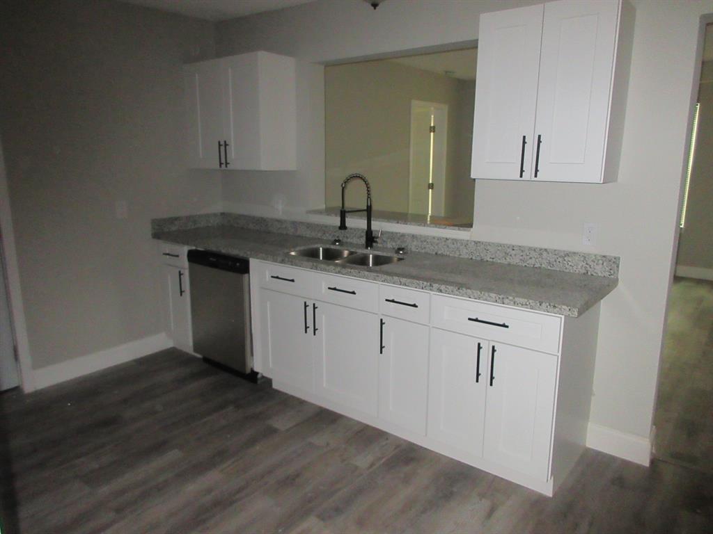 328 South Talton Street Minden, LA 71055 - Photo 7 of 21 a view with a sink and a mirror