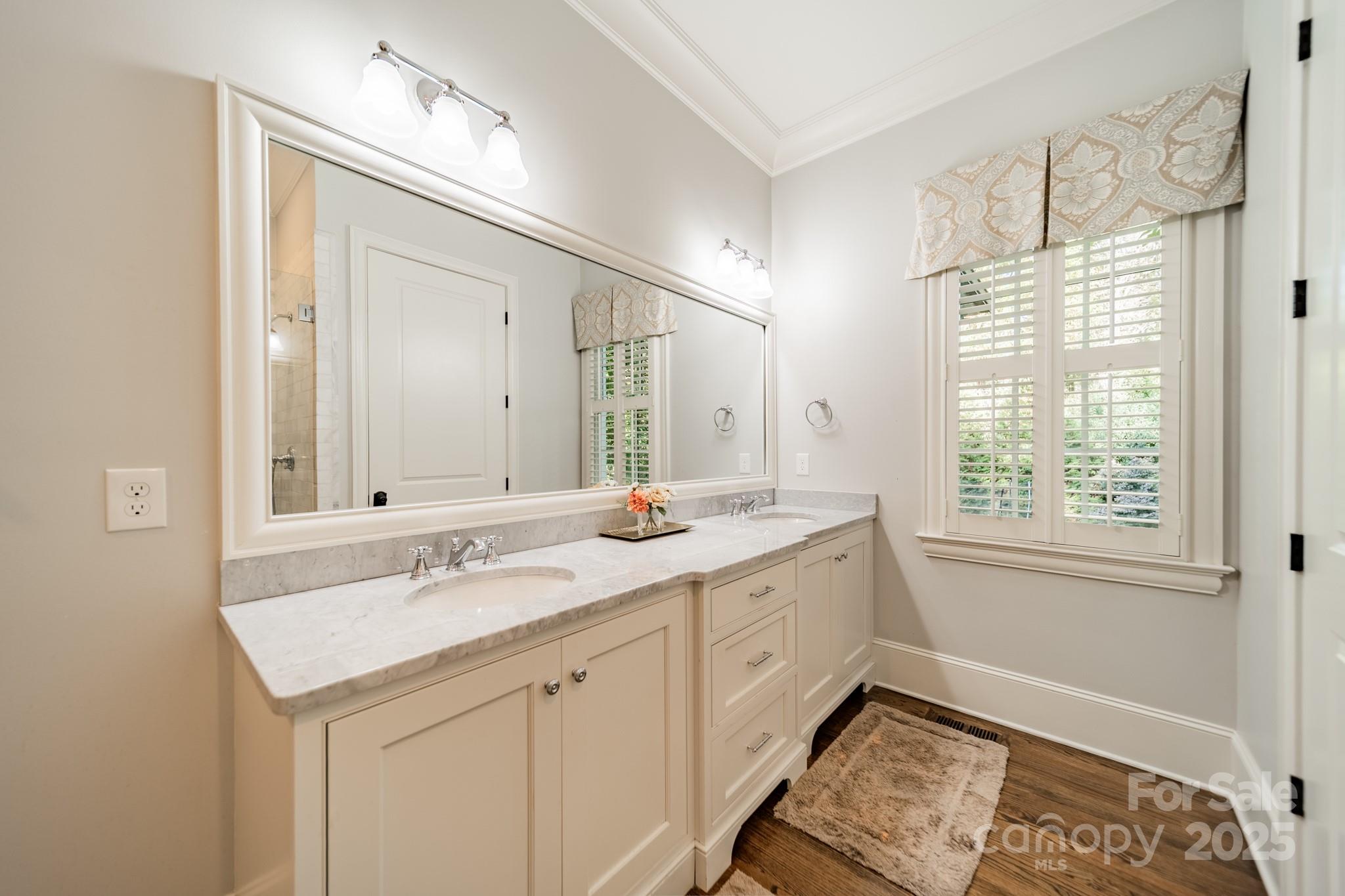 4141 Tyng Way Charlotte, NC 28211 - Photo 20 of 48 a spacious bathroom with a double vanity sink mirror and