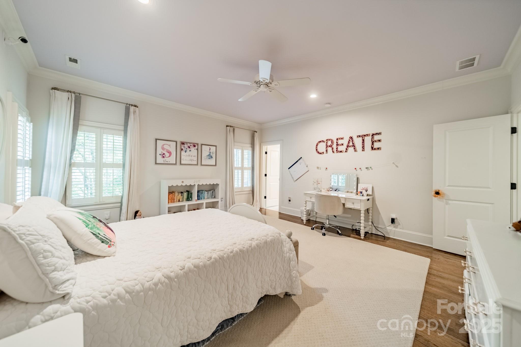 4141 Tyng Way Charlotte, NC 28211 - Photo 28 of 48 a bedroom with a large bed and a window