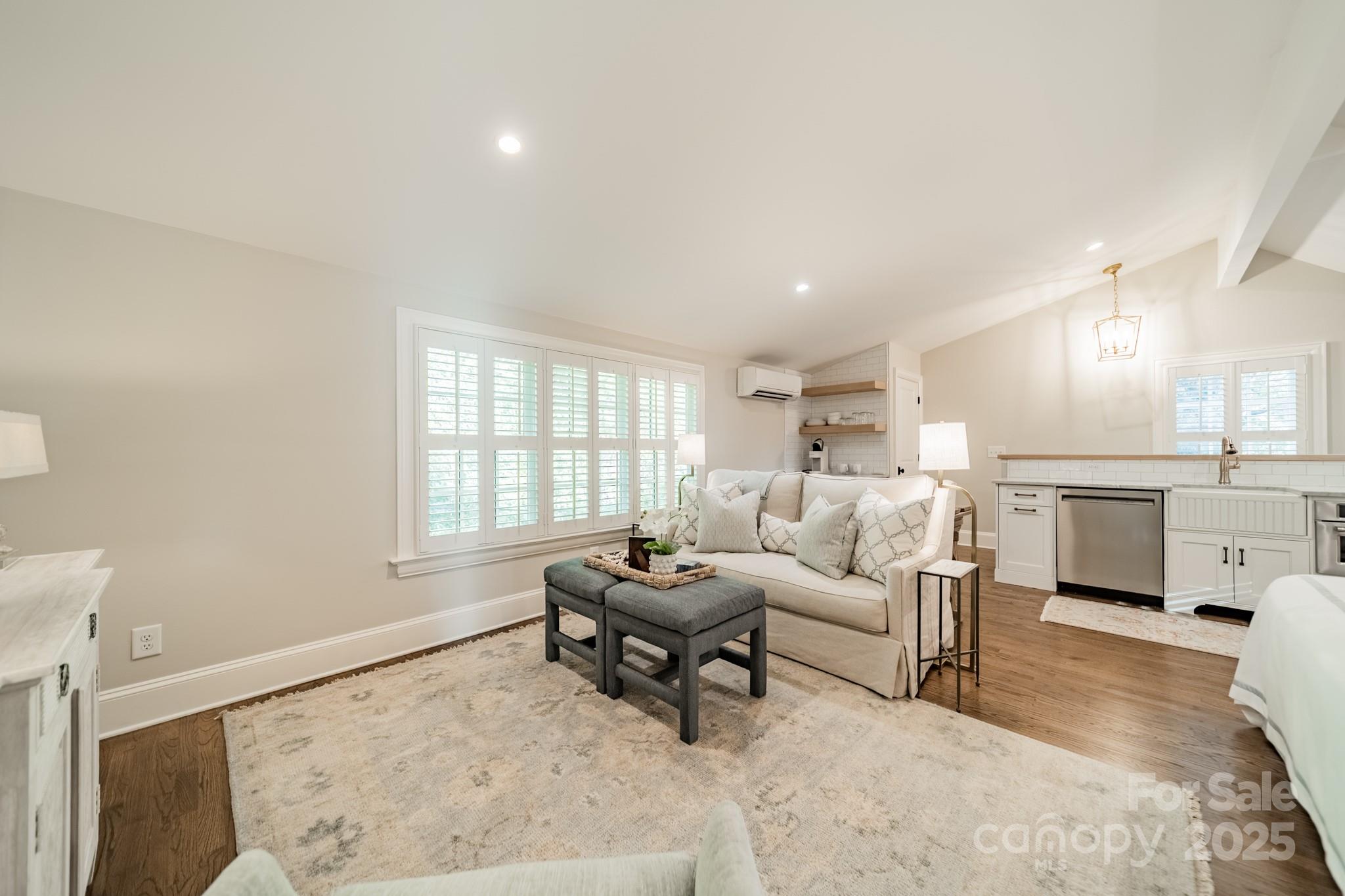 4141 Tyng Way Charlotte, NC 28211 - Photo 38 of 48 a living room with furniture and a large window