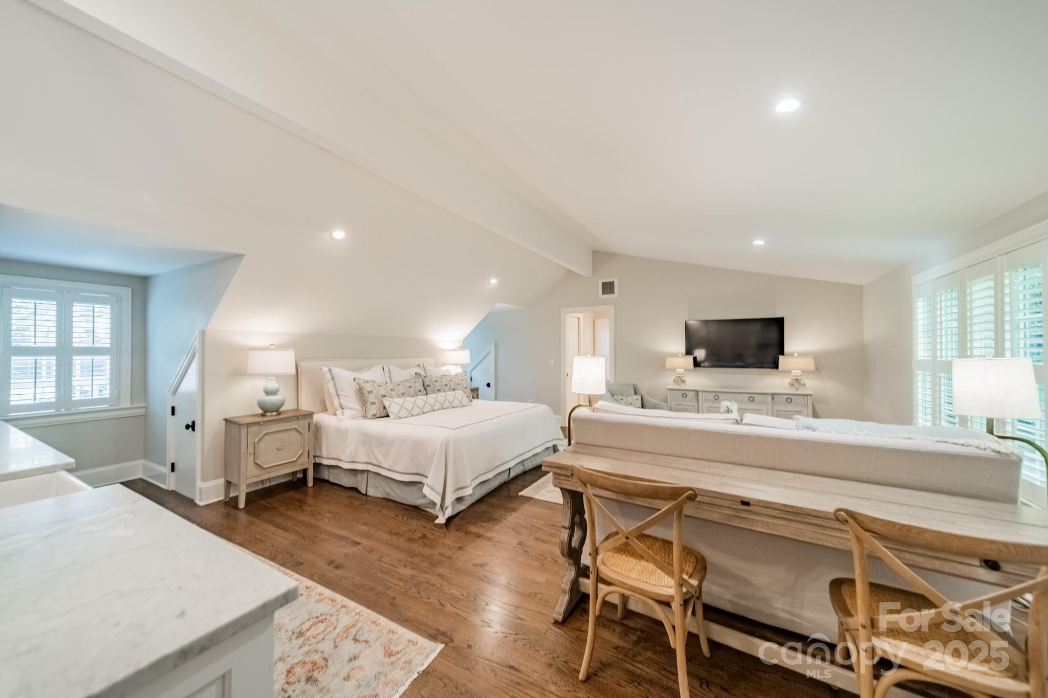 4141 Tyng Way Charlotte, NC 28211 - Photo 39 of 48 a large white room with a large bed and furniture