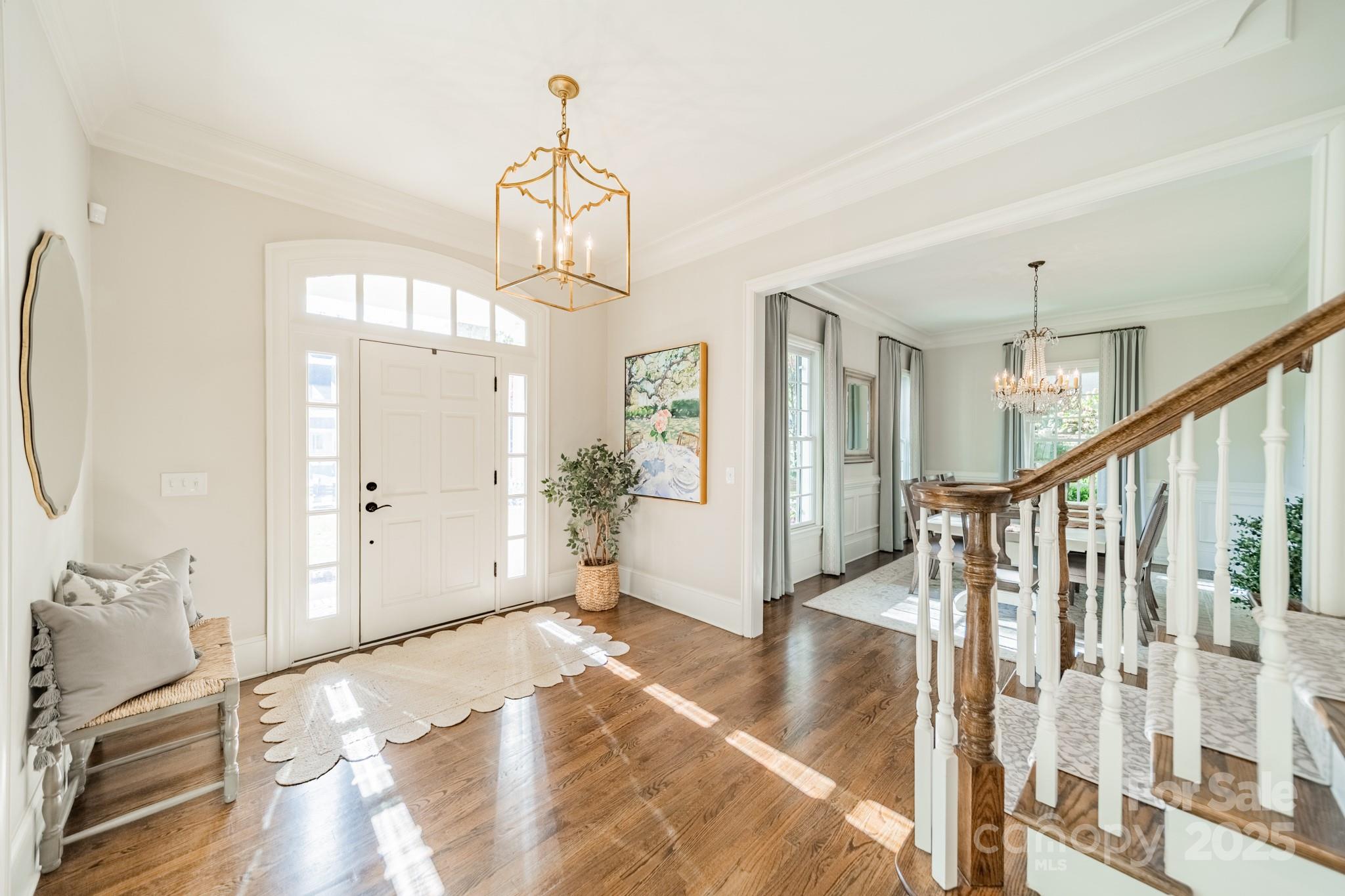 4141 Tyng Way Charlotte, NC 28211 - Photo 4 of 48 a view of a livingroom with wooden floor and stairs