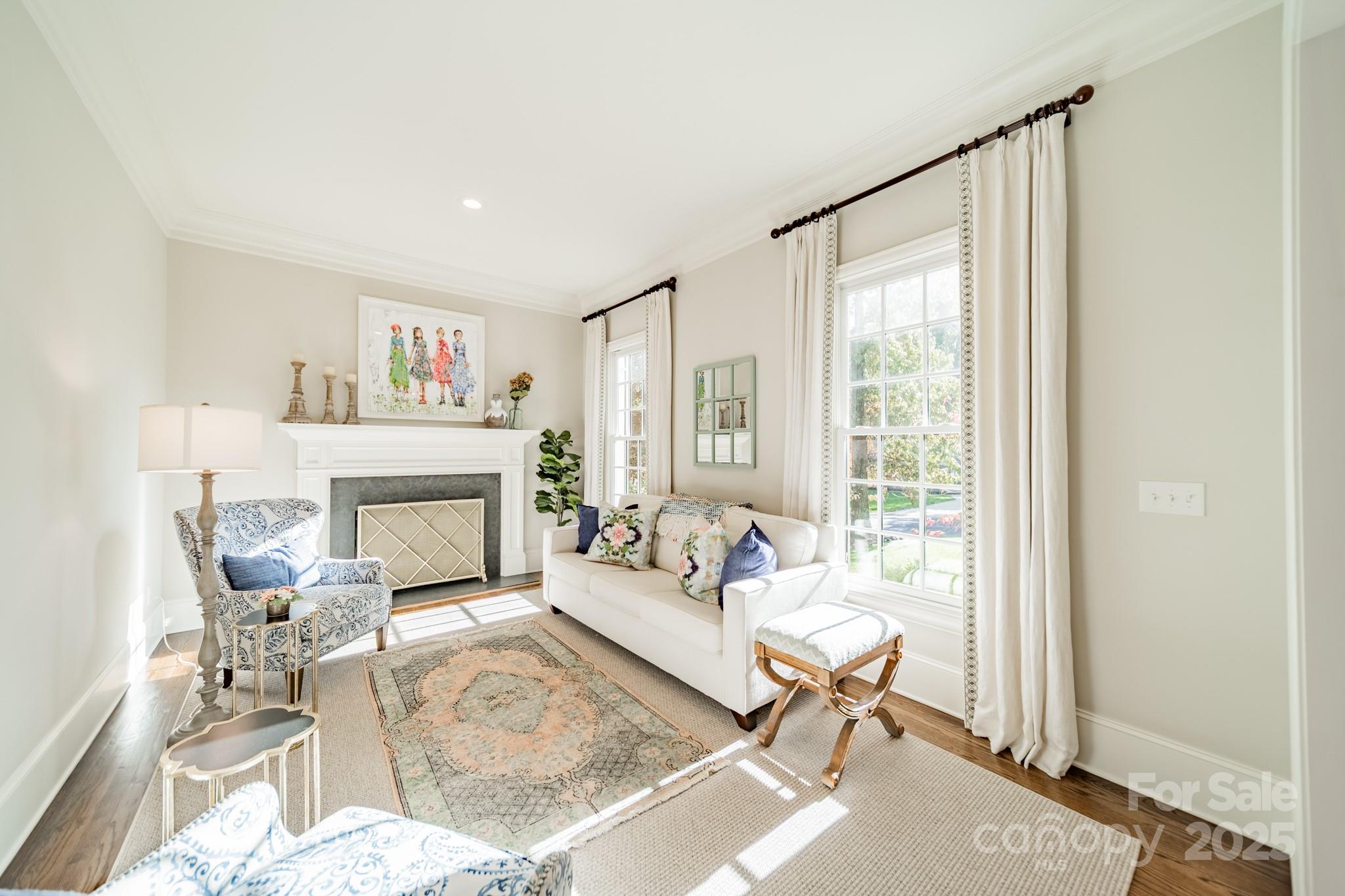4141 Tyng Way Charlotte, NC 28211 - Photo 5 of 48 a living room with furniture and a fireplace