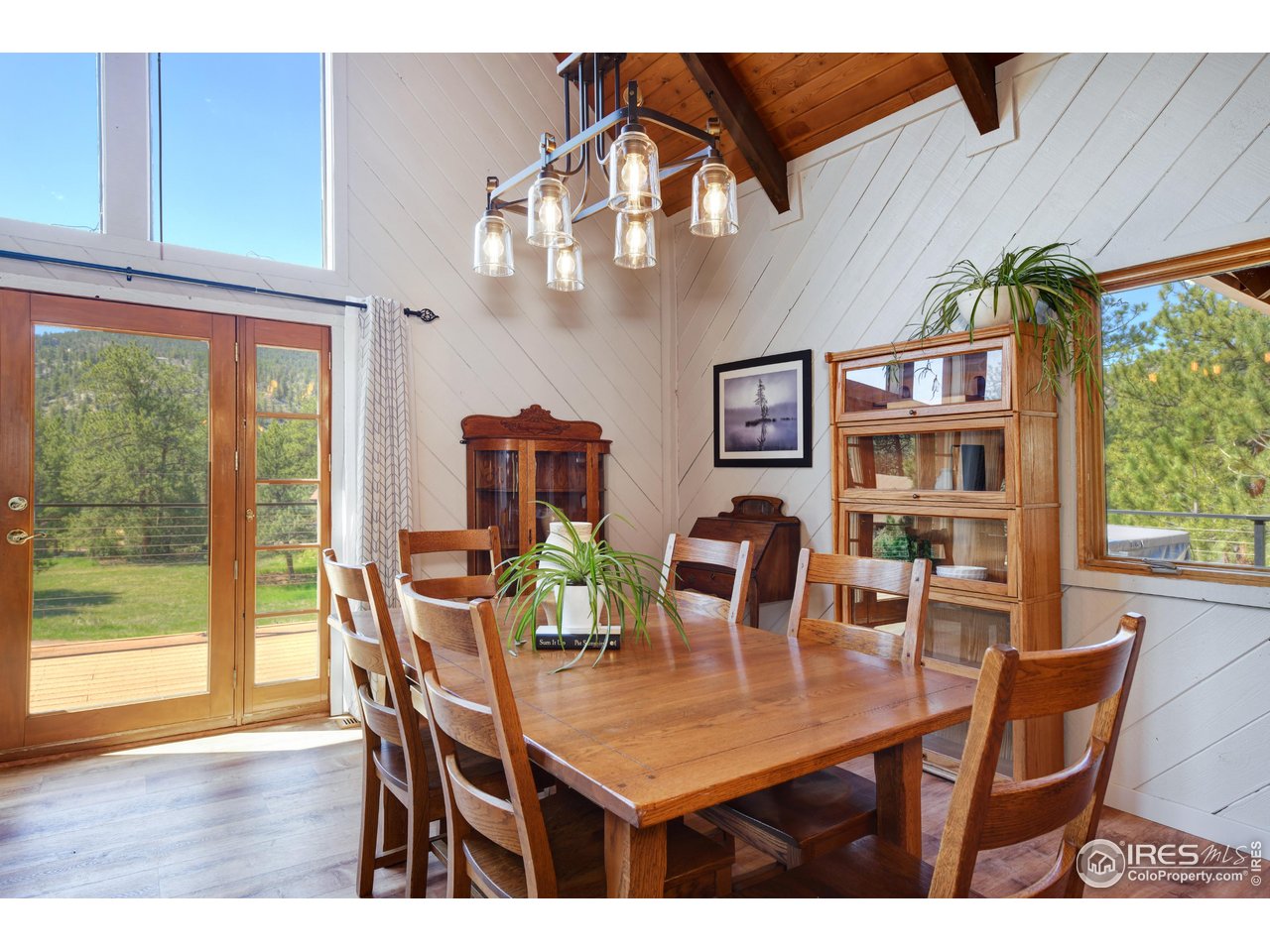 40 Hopi Court Lyons, CO 80540 - Photo 11 of 40 a view of a dining room with furniture window and outside view