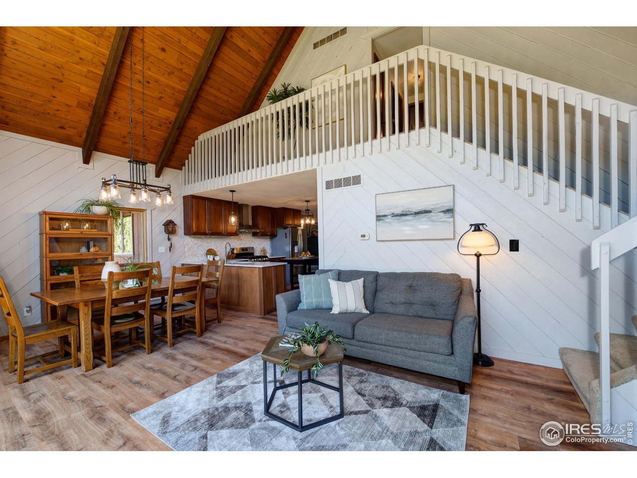 40 Hopi Court Lyons, CO 80540 - Photo 12 of 40 a living room with furniture and a flat screen tv