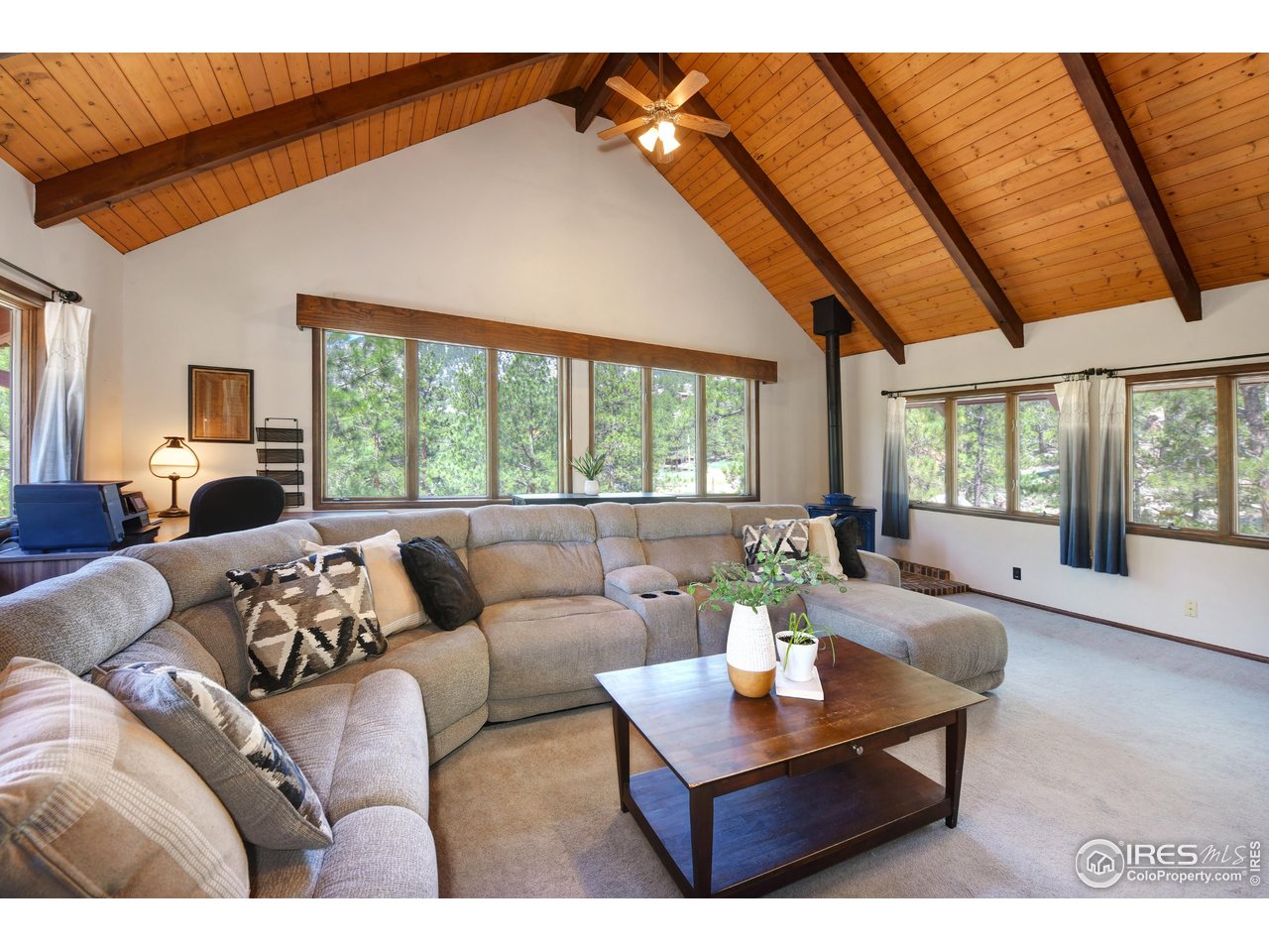 40 Hopi Court Lyons, CO 80540 - Photo 13 of 40 a living room with furniture and a large window