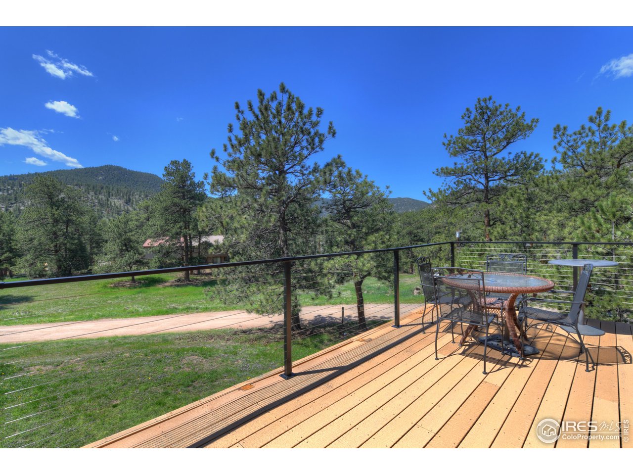 40 Hopi Court Lyons, CO 80540 - Photo 16 of 40 a view of a yard with a porch