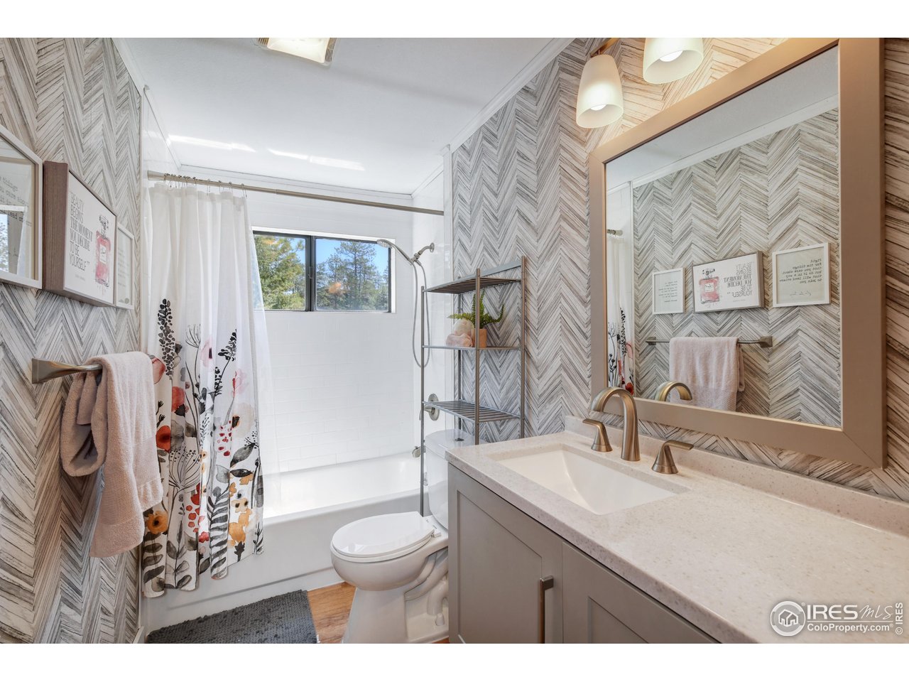 40 Hopi Court Lyons, CO 80540 - Photo 21 of 40 a bathroom with a sink toilet and shower