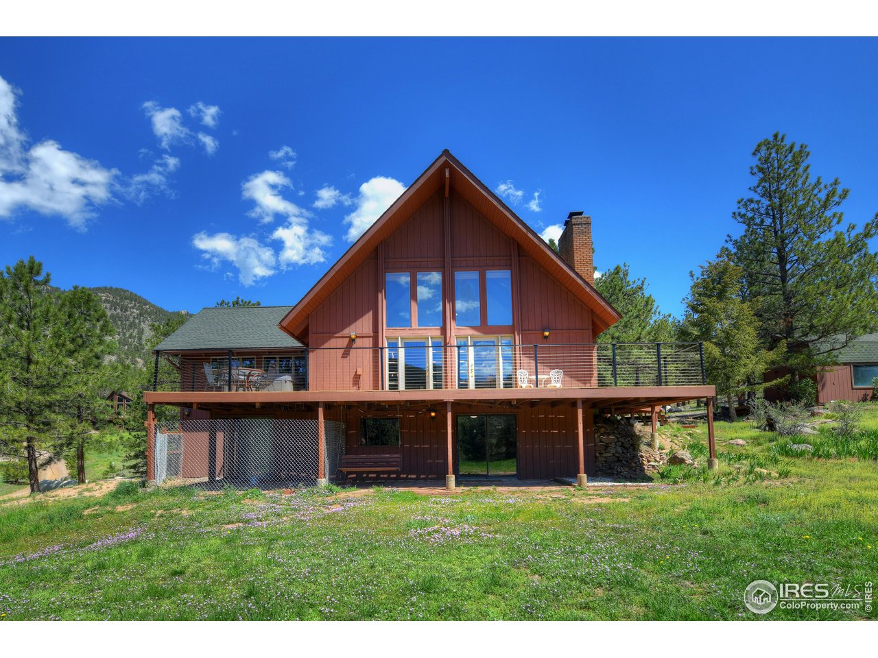 40 Hopi Court Lyons, CO 80540 - Photo 23 of 40 a front view of a house with a yard