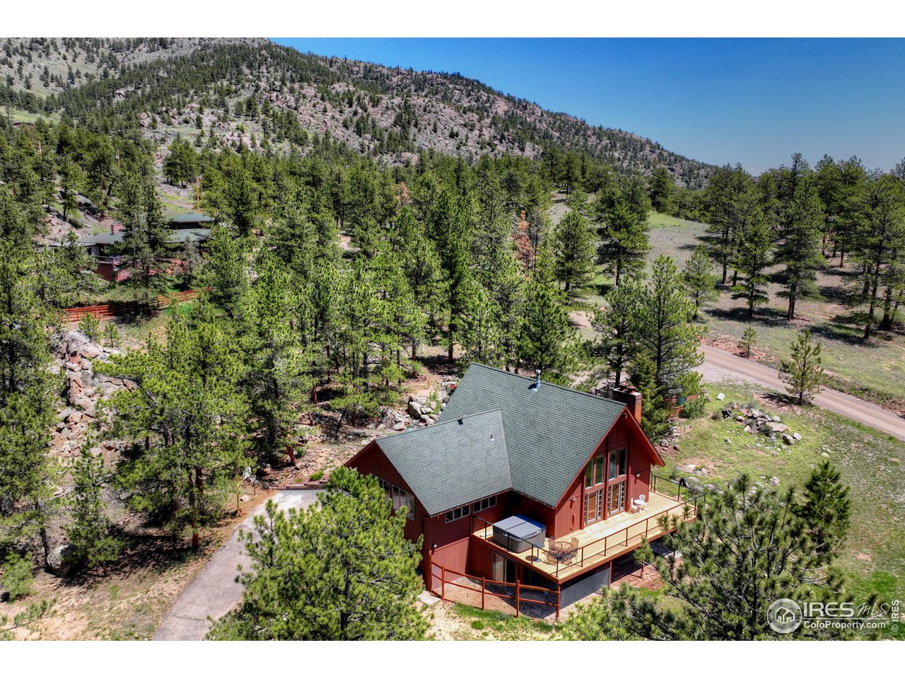 40 Hopi Court Lyons, CO 80540 - Photo 24 of 40 an aerial view of a house with yard and outdoor seating