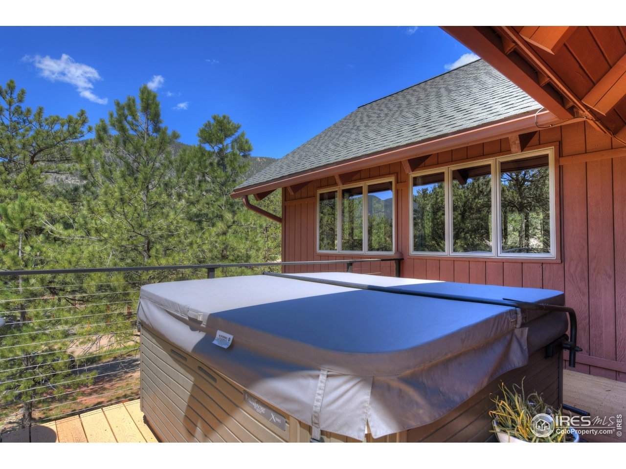 40 Hopi Court Lyons, CO 80540 - Photo 25 of 40 a view of swimming pool with outdoor seating and plants