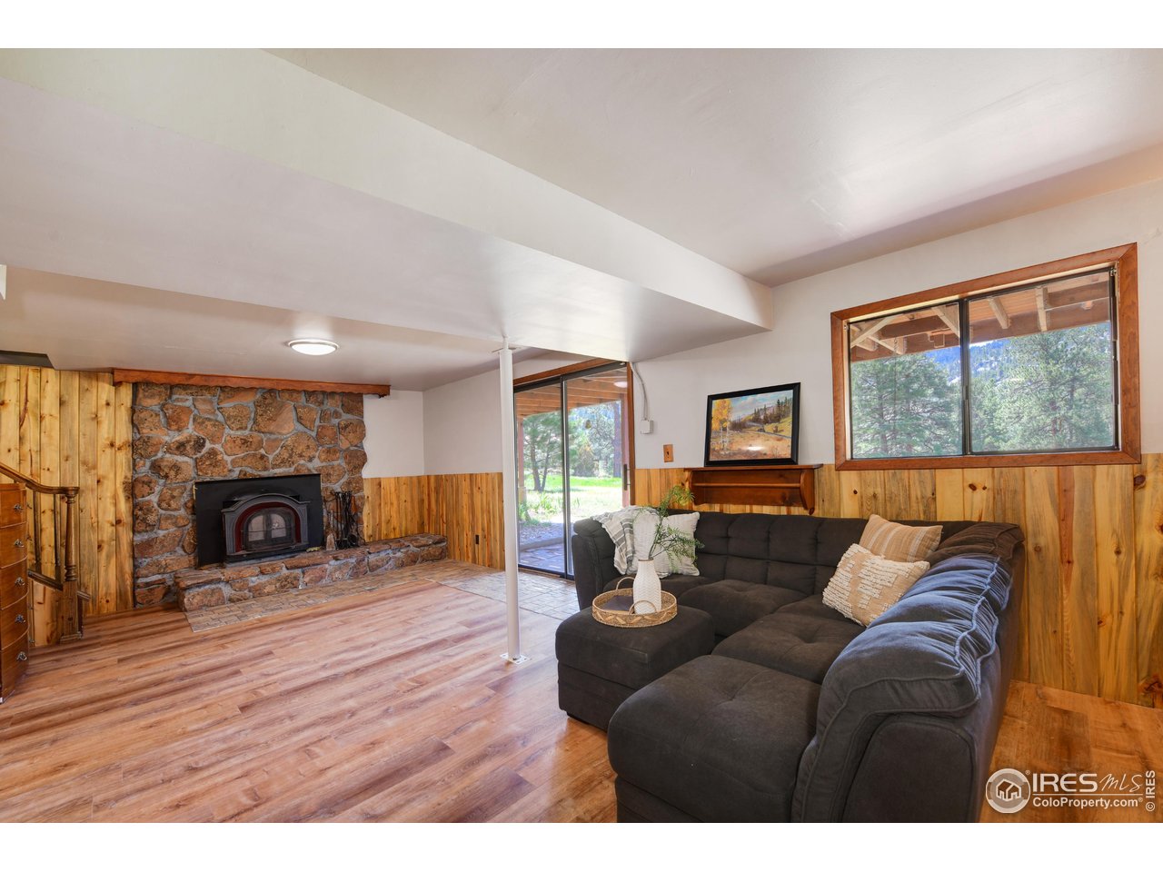 40 Hopi Court Lyons, CO 80540 - Photo 28 of 40 a living room with furniture and a fireplace