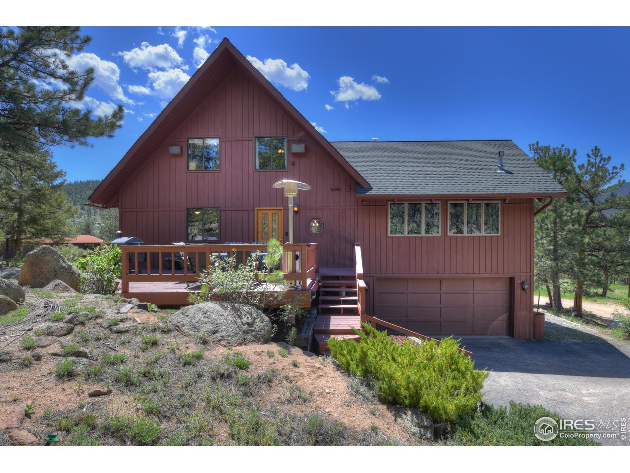 40 Hopi Court Lyons, CO 80540 - Photo 34 of 40 a front view of a house with a yard