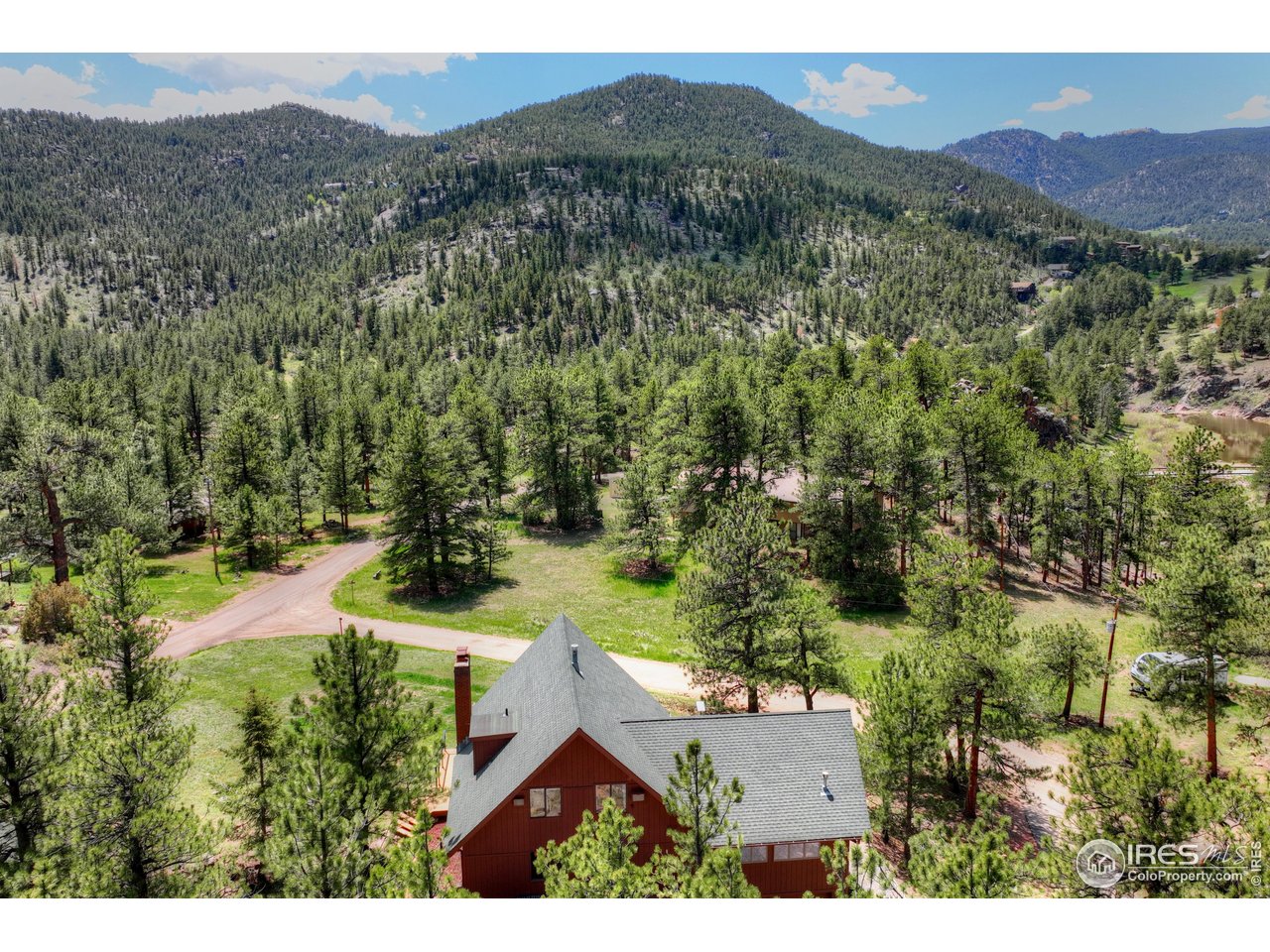 40 Hopi Court Lyons, CO 80540 - Photo 39 of 40 an aerial view of residential house with an outdoor space and mountain view