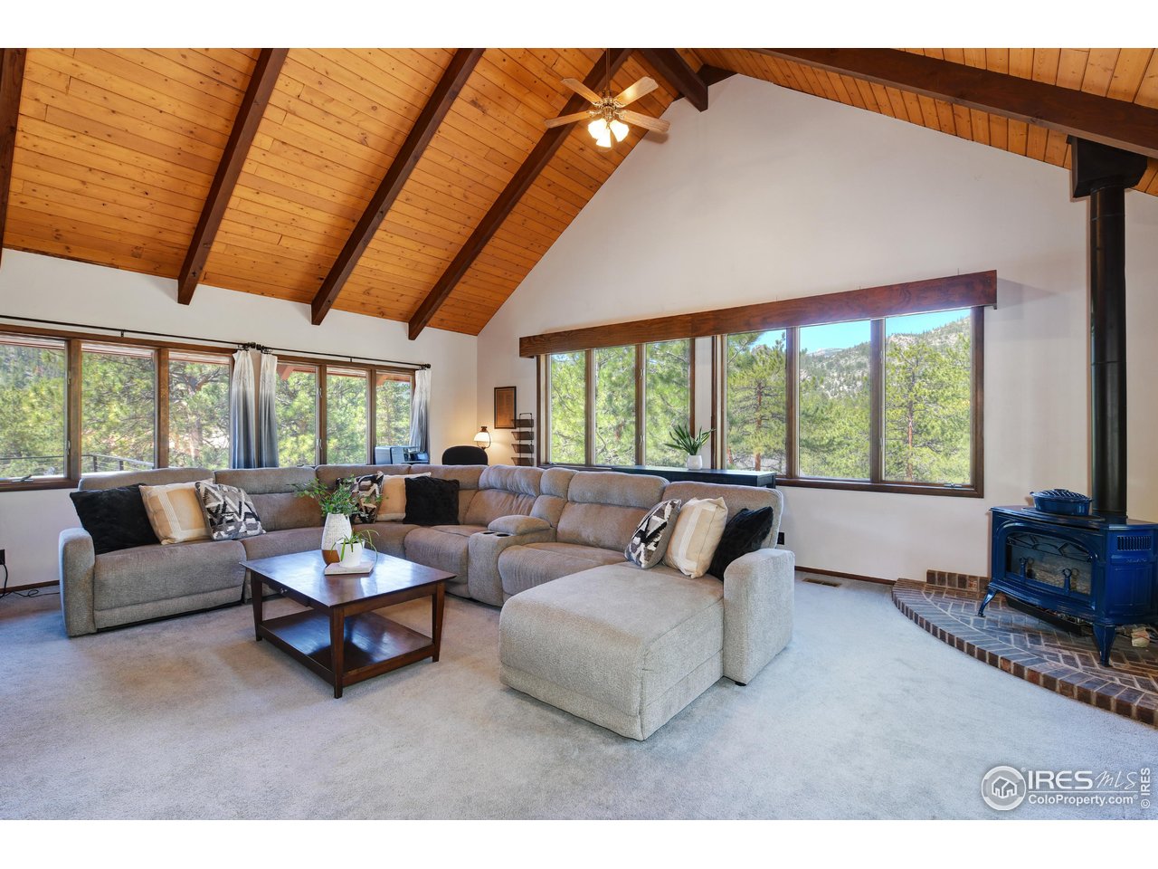 40 Hopi Court Lyons, CO 80540 - Photo 4 of 40 a living room with furniture and a large window
