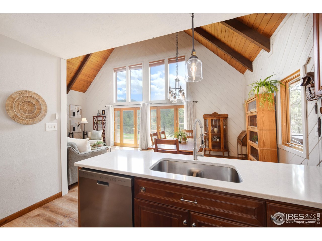 40 Hopi Court Lyons, CO 80540 - Photo 8 of 40 a kitchen with a sink cabinets and a large window