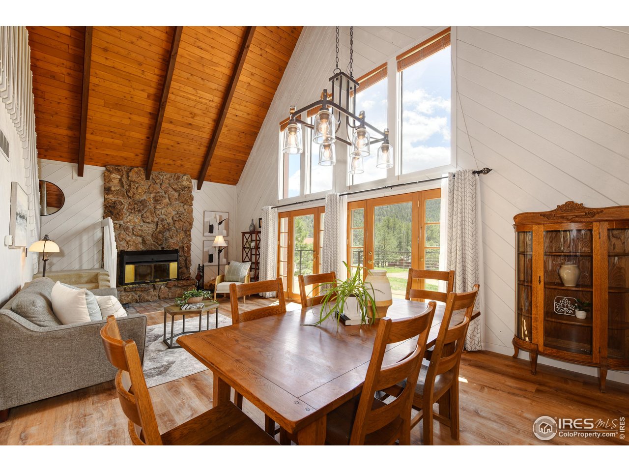 40 Hopi Court Lyons, CO 80540 - Photo 10 of 40 a view of a dining room with furniture window and outside view