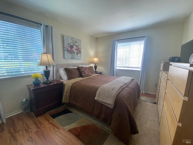 a view of street with parked cars