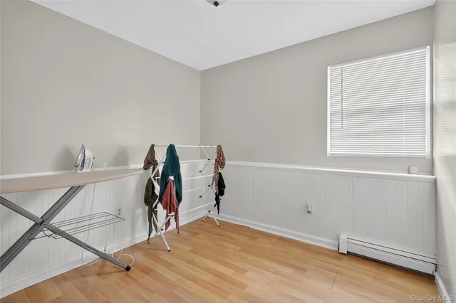 a view of a room with rack and bicycle