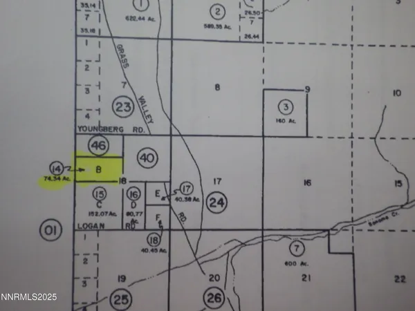 a view of an ocean beach and mountain