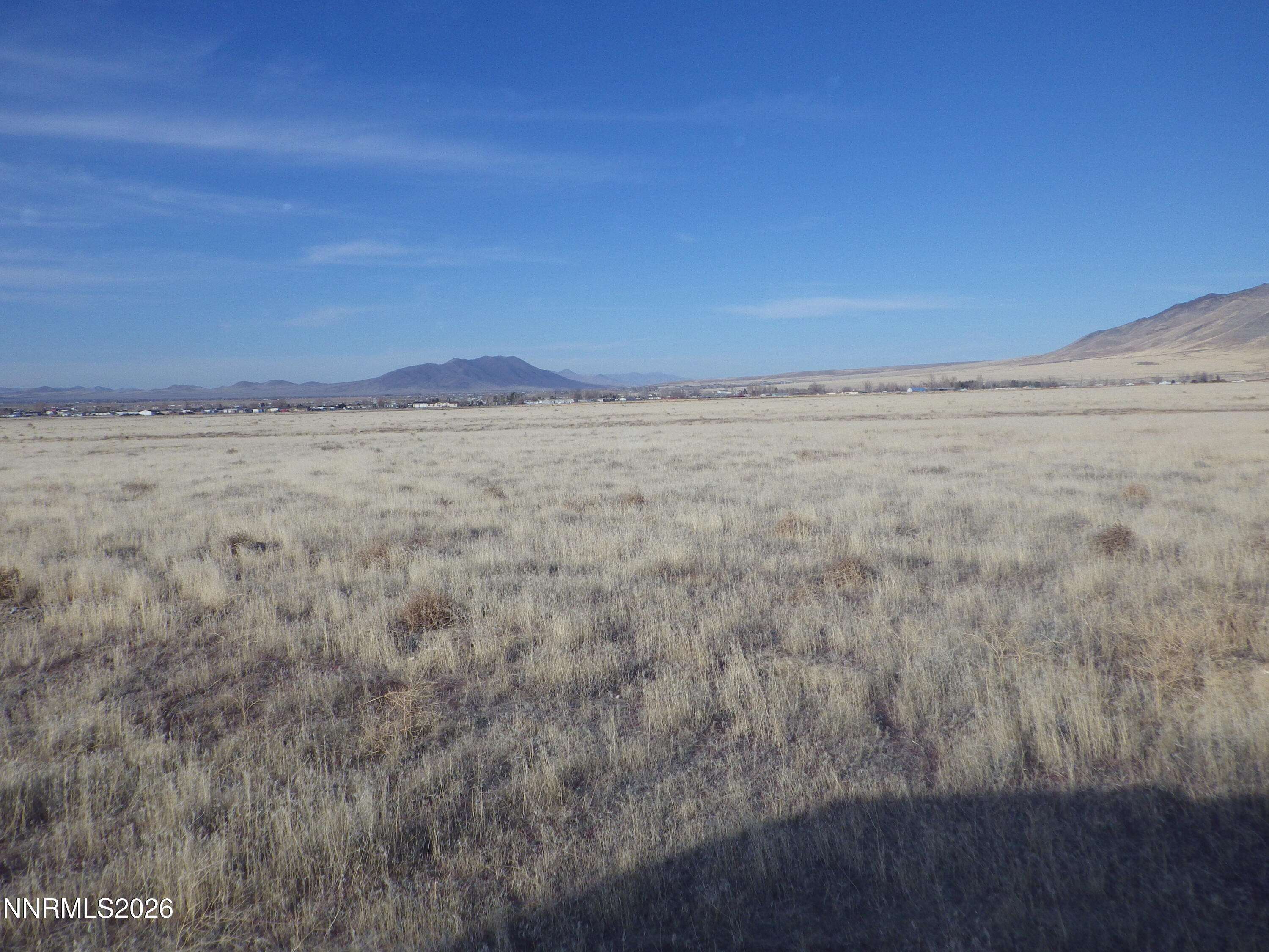 0 Ruiz Road, Unit 922014 Winnemucca, NV 89445 - Photo 2 of 8 a view of an ocean beach and mountain