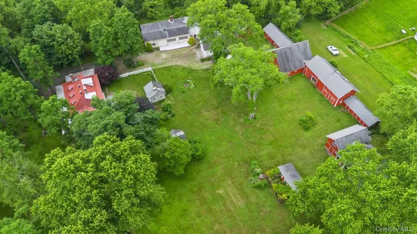 a view of a dining room with furniture and window