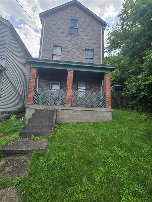 1490 Island Avenue McKees Rocks, PA 15136 - Photo 27 of 30 a front view of a house with garden