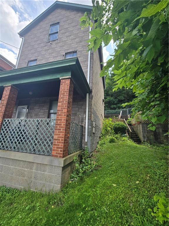 1490 Island Avenue McKees Rocks, PA 15136 - Photo 30 of 30 a backyard of a house with lots of green space