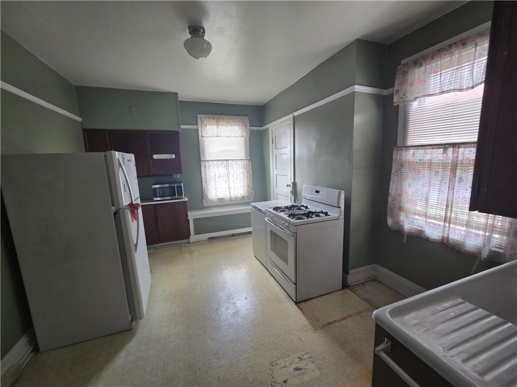 1490 Island Avenue McKees Rocks, PA 15136 - Photo 8 of 30 a kitchen with refrigerator and window