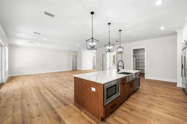 a room that has a bed and a chair in it