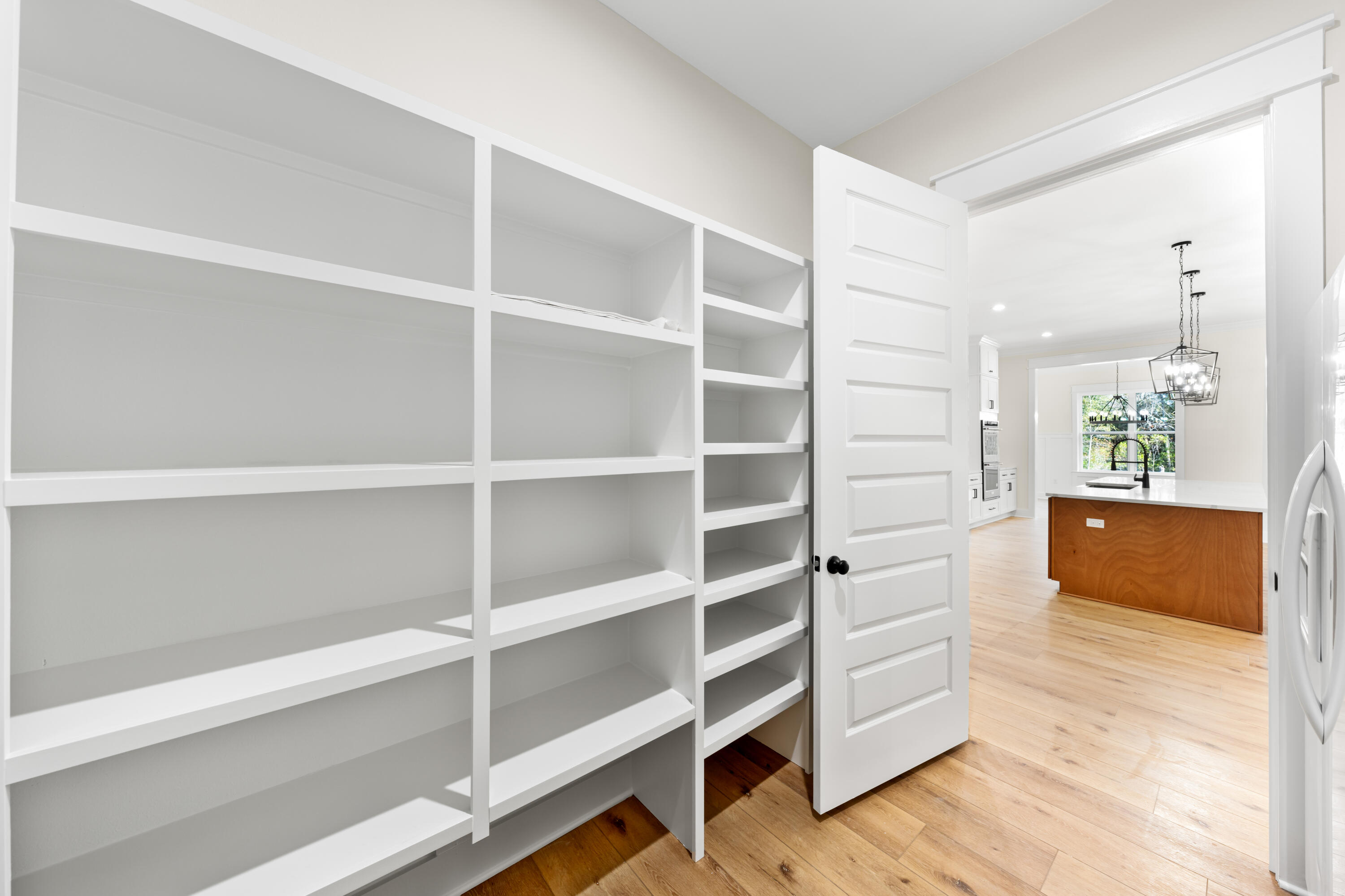 177 Harmony Way Freeport, FL 32439 - Photo 22 of 87 a view of an empty room with cabinet and a window