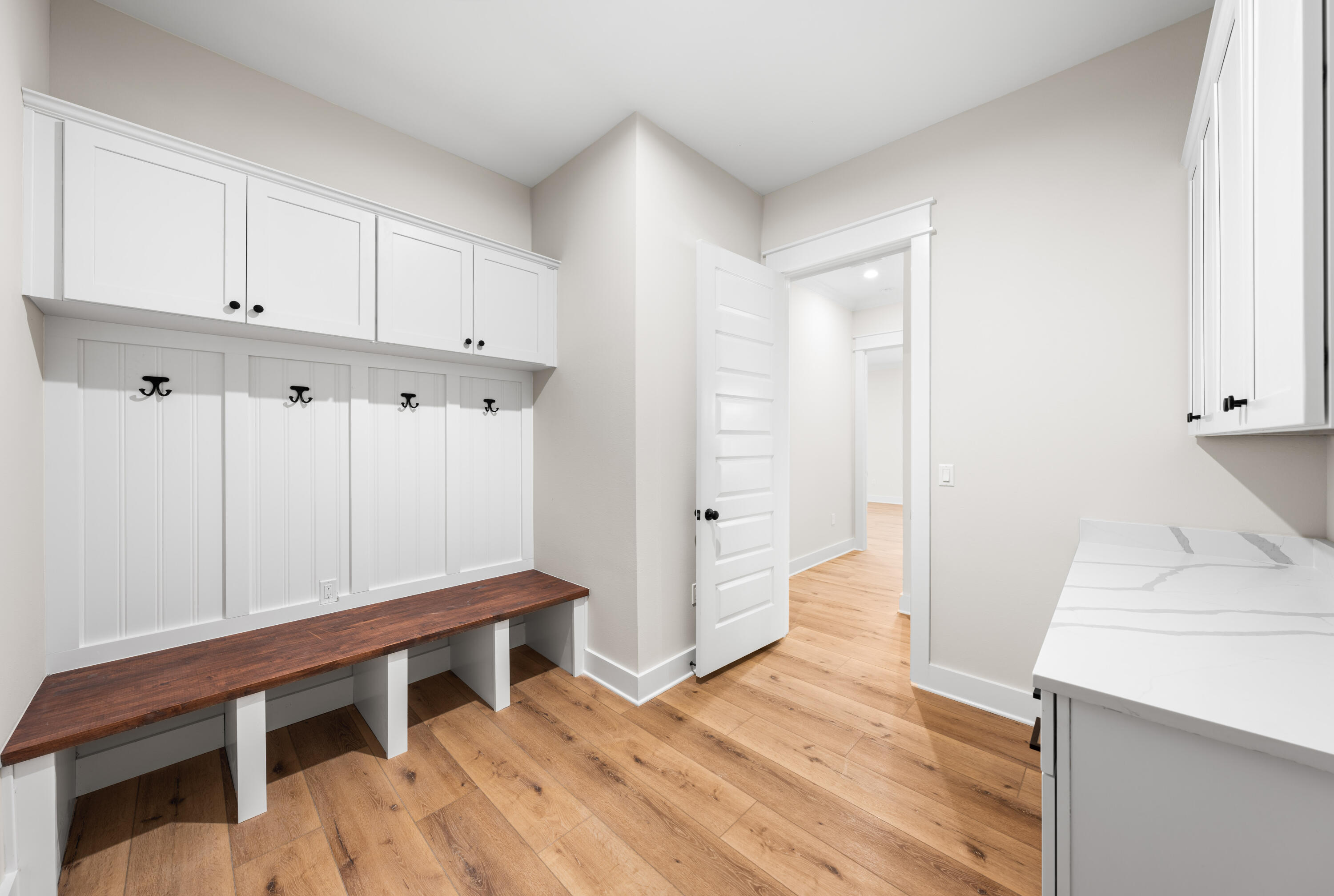 177 Harmony Way Freeport, FL 32439 - Photo 23 of 87 a room that has a bed and a chair in it